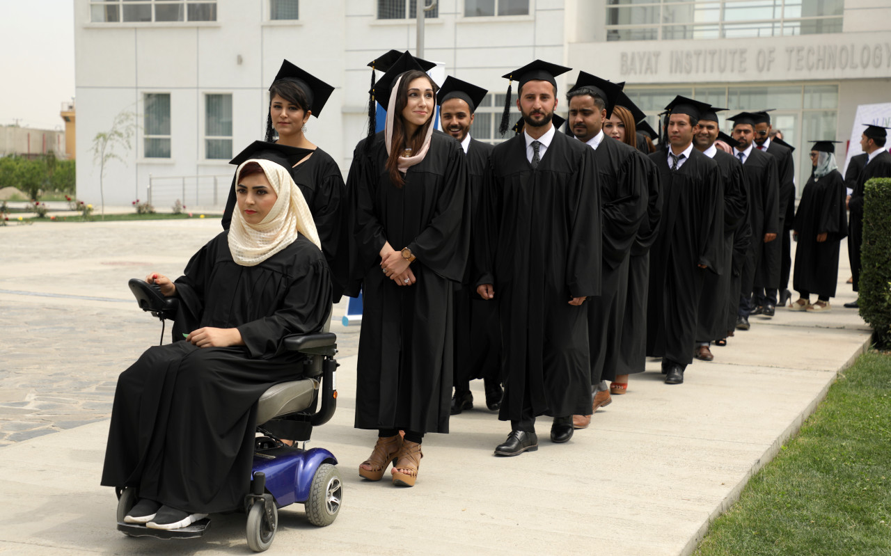 Photos of woman graduating from college go viral and inspire a beleaguered nation