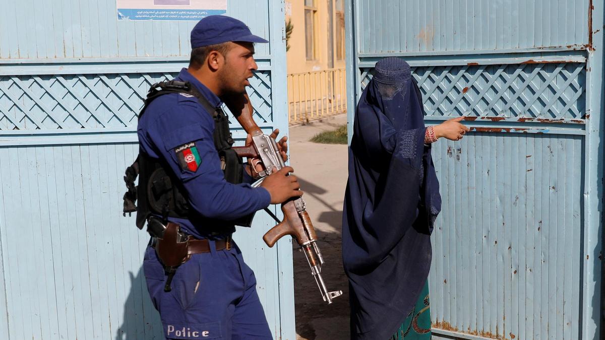 Wounded but undeterred, Afghan blast survivors return to polling stations